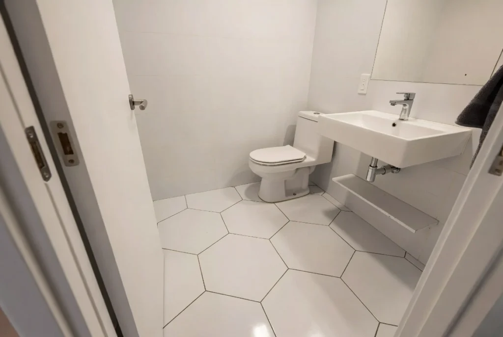 2. Bold Hexagonal Tiles Creative Small Bathroom Ideas